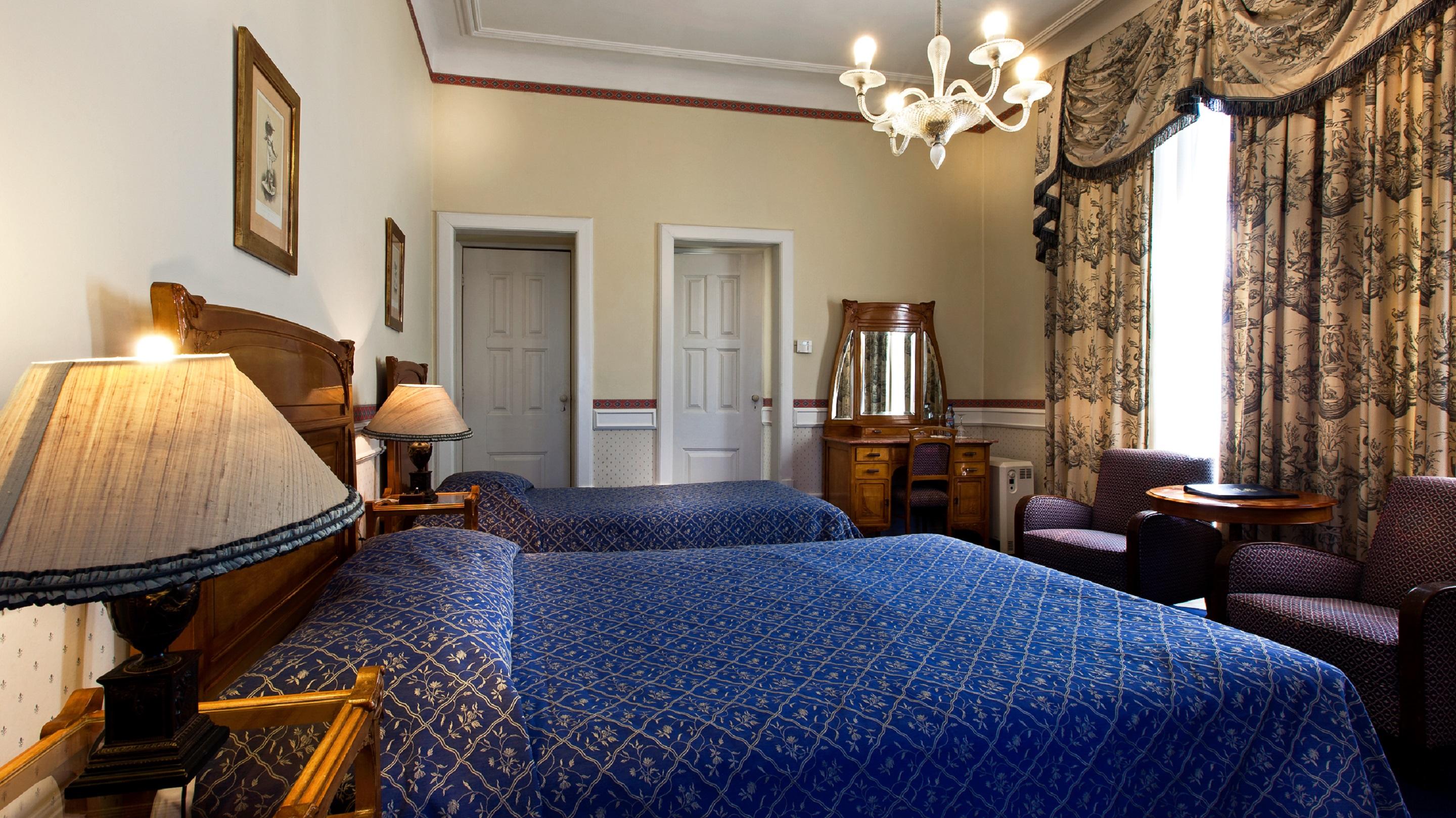 Palace Hotel Do Bussaco Лузу Экстерьер фото A room at the hotel
