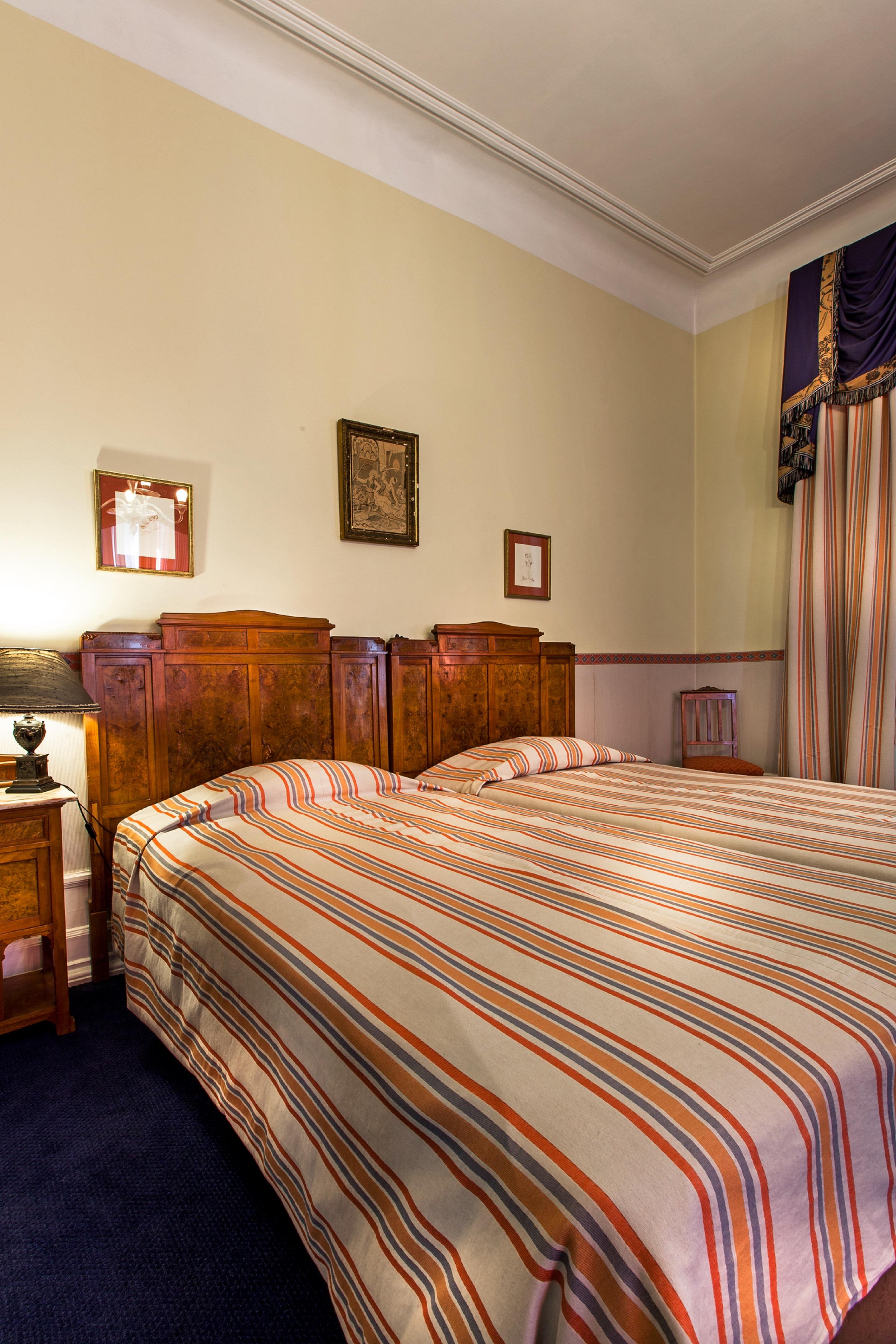 Palace Hotel Do Bussaco Лузу Экстерьер фото A bedroom at the hotel