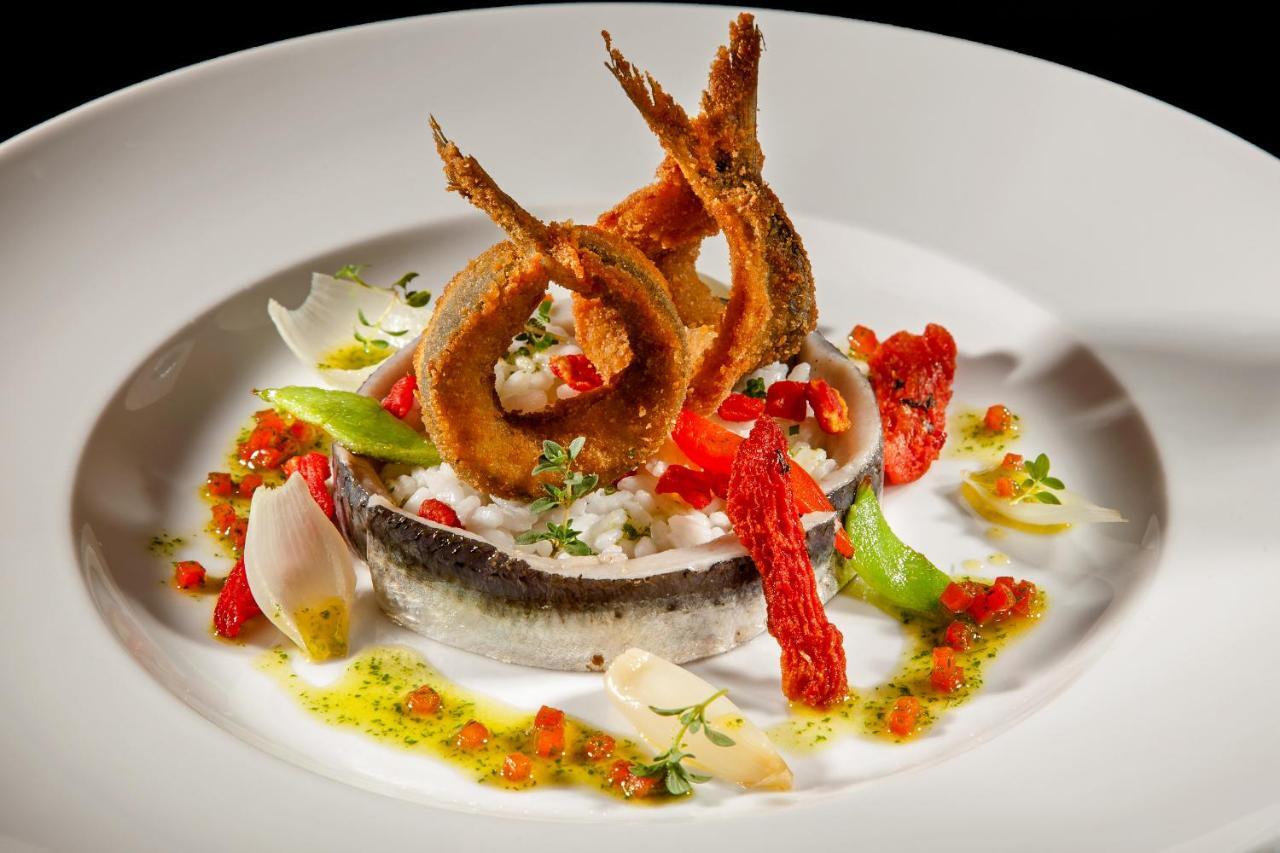 Palace Hotel Do Bussaco Лузу Экстерьер фото A dish of fried fish